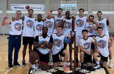 The MIT Sloan Basketball Club team poses for a group photo