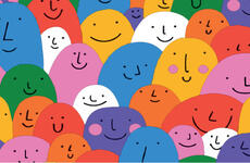 Graphic of many multi-colored smiling faces