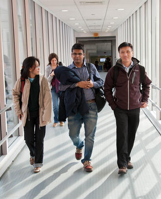 A photo of students walking on campus