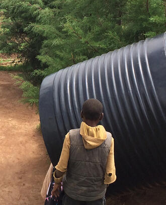 March 25, 2015. Gicumbi, Rwanda. Water tank installation.