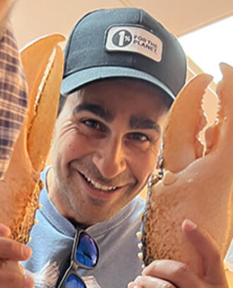Jeff Tedmori poses for photo with lobster