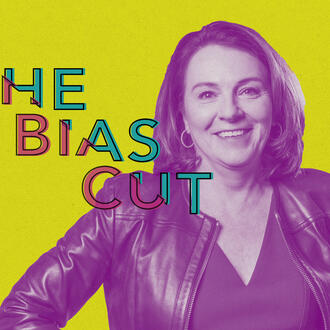 Jackie Yeaney stands with her hands on her hips and smiles. The words "The Bias Cut" descend from left to right across her shoulder.