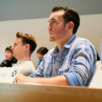 Jack O'Brien, a student, sits in his class.