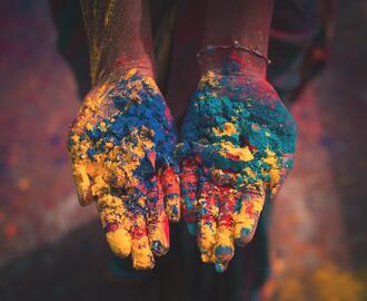 Woman holding color soils