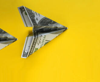 $100 dollar bills made into paper airplanes