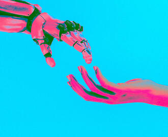 A robot hand and a human hand connect