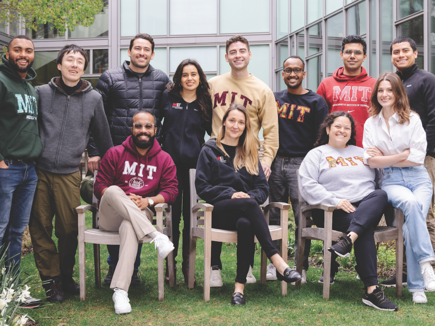 A group of MIT Sloan students pose in Bergstrom Garden