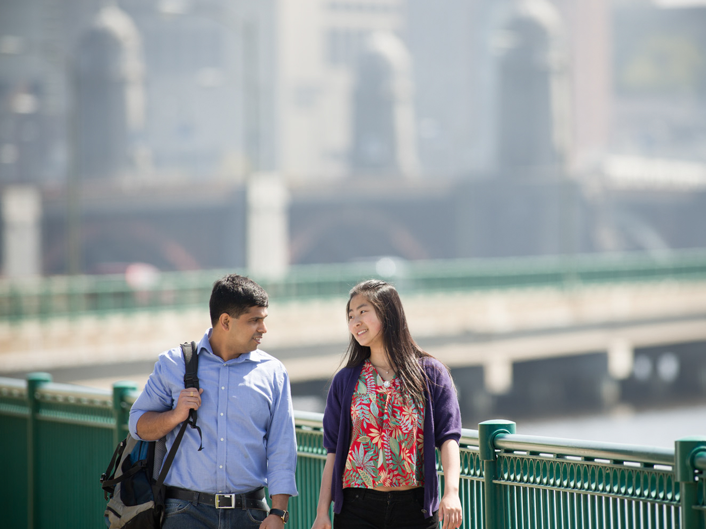 Students walking on bridge