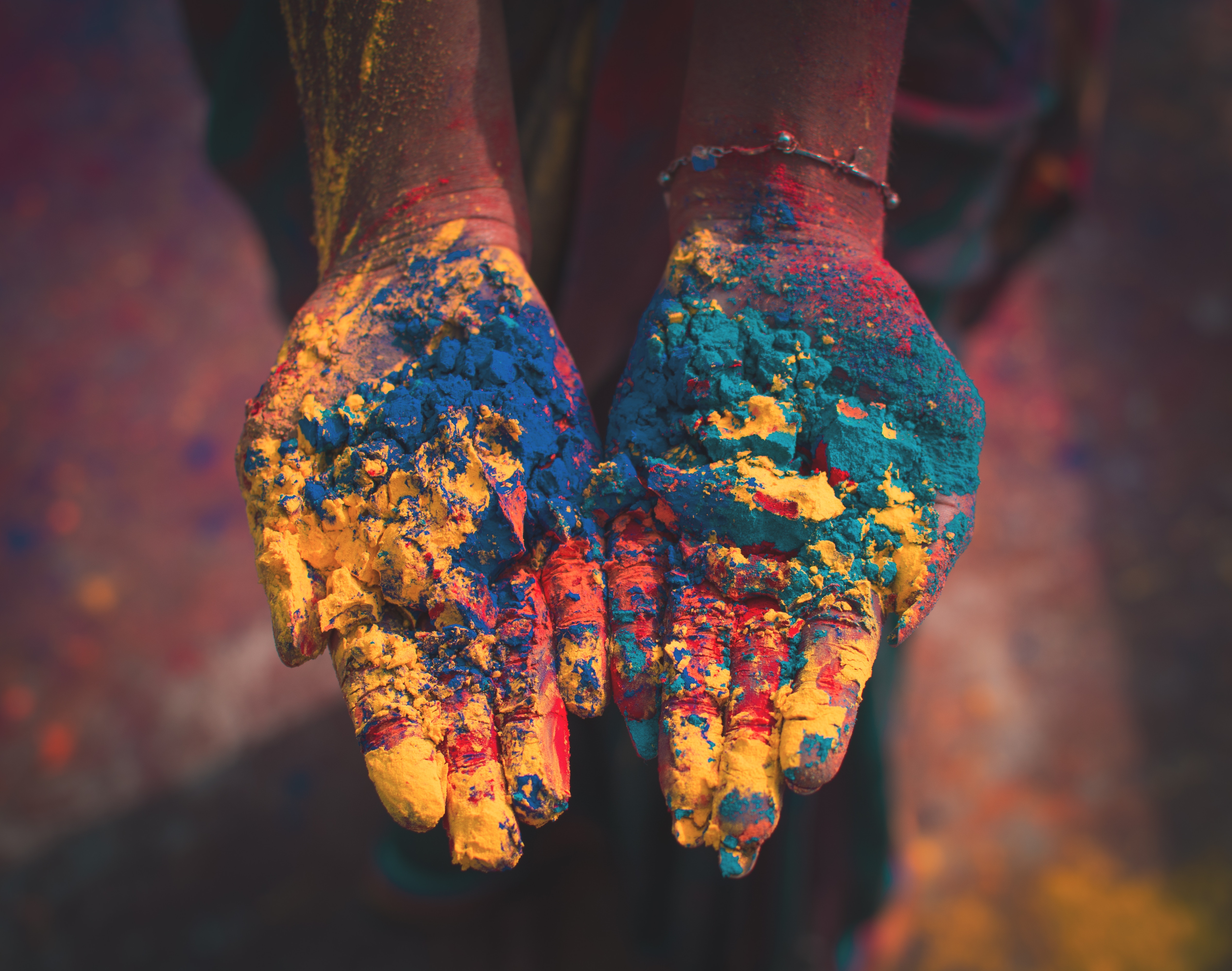 Indian Woman holding color soils
