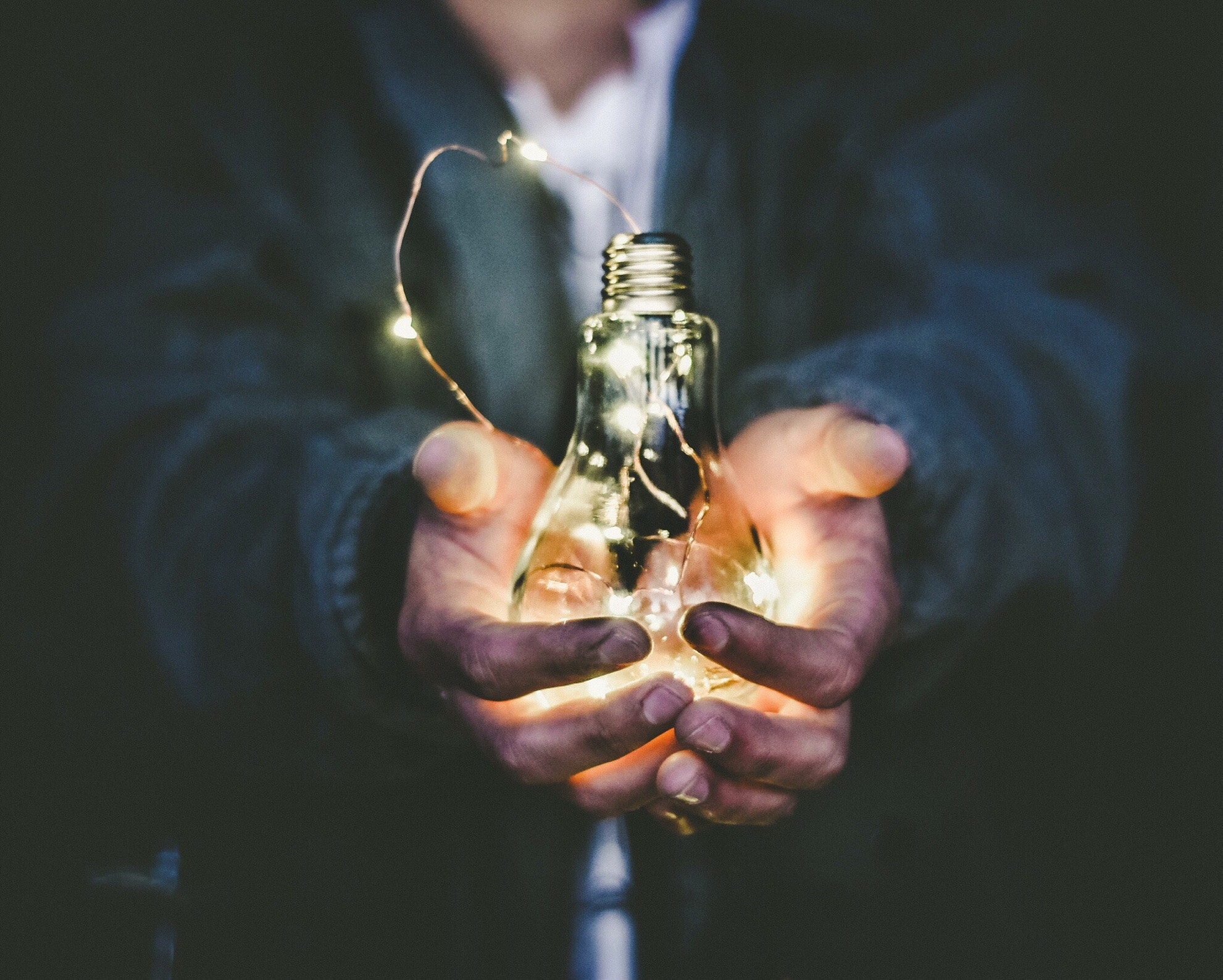 Man holding lightbulb