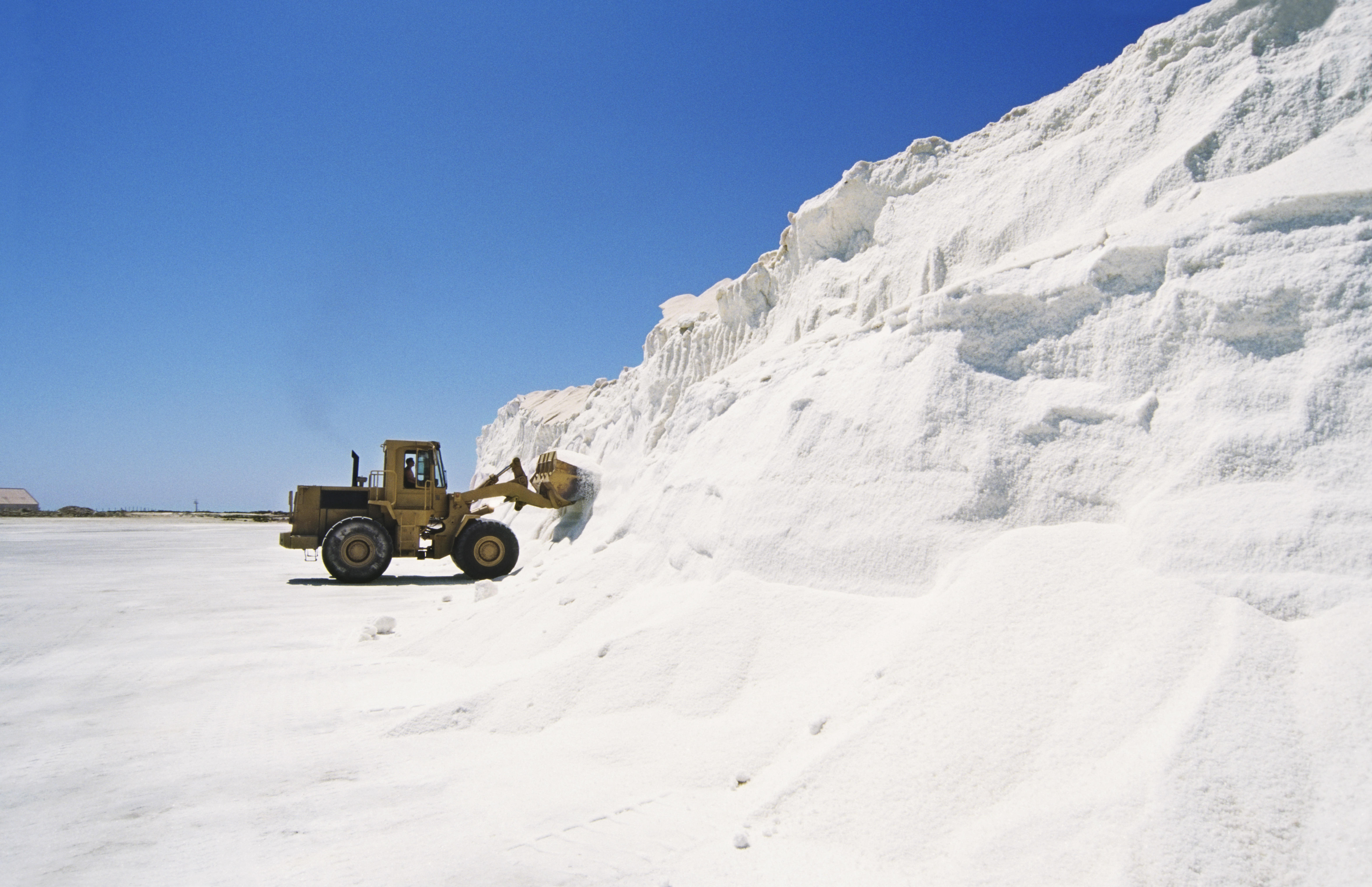Truck digging salt
