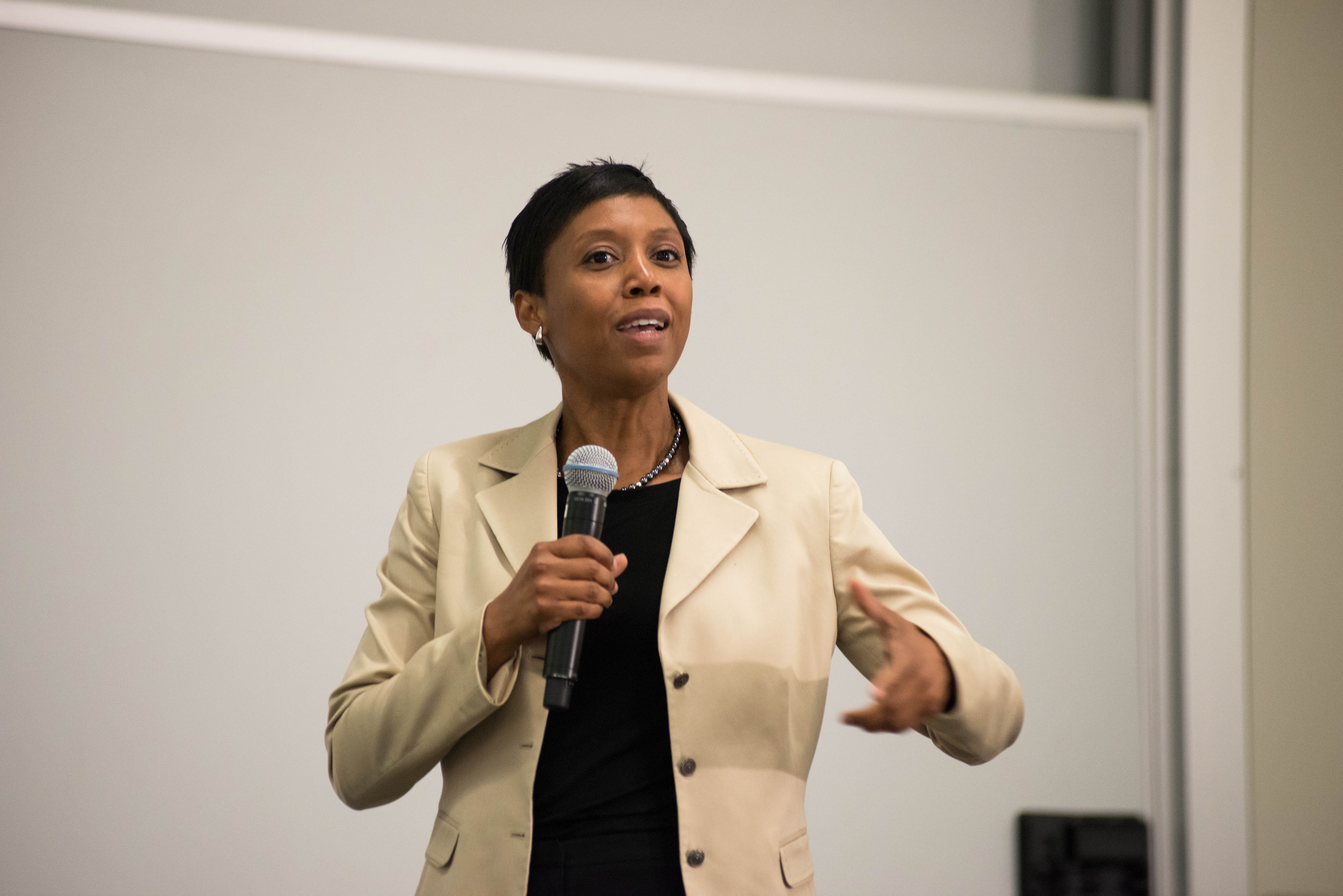 Michellana Jester, G-Lab faculty member, speaking with microphone