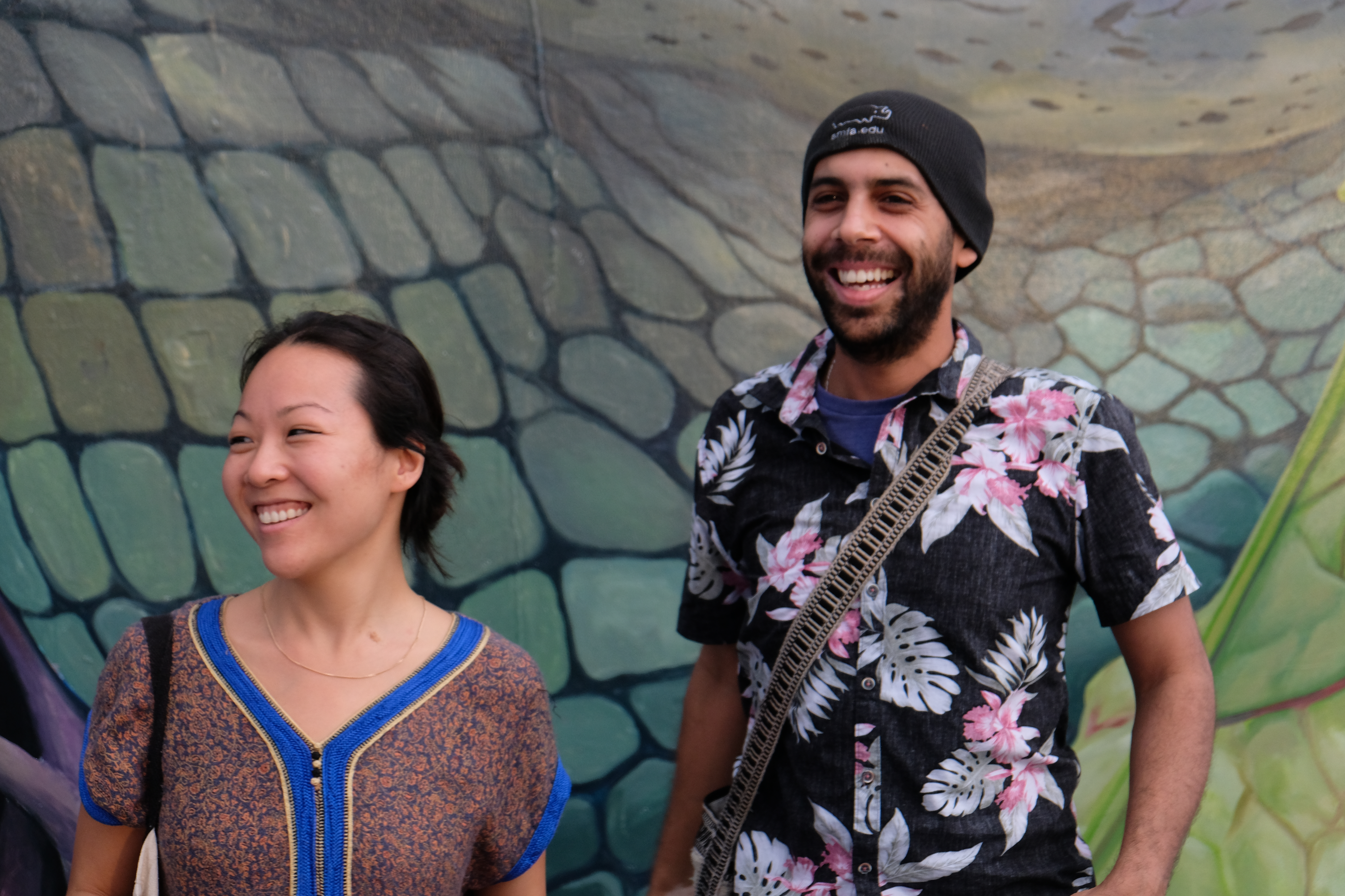 Linda Cheung in front of her mural. 