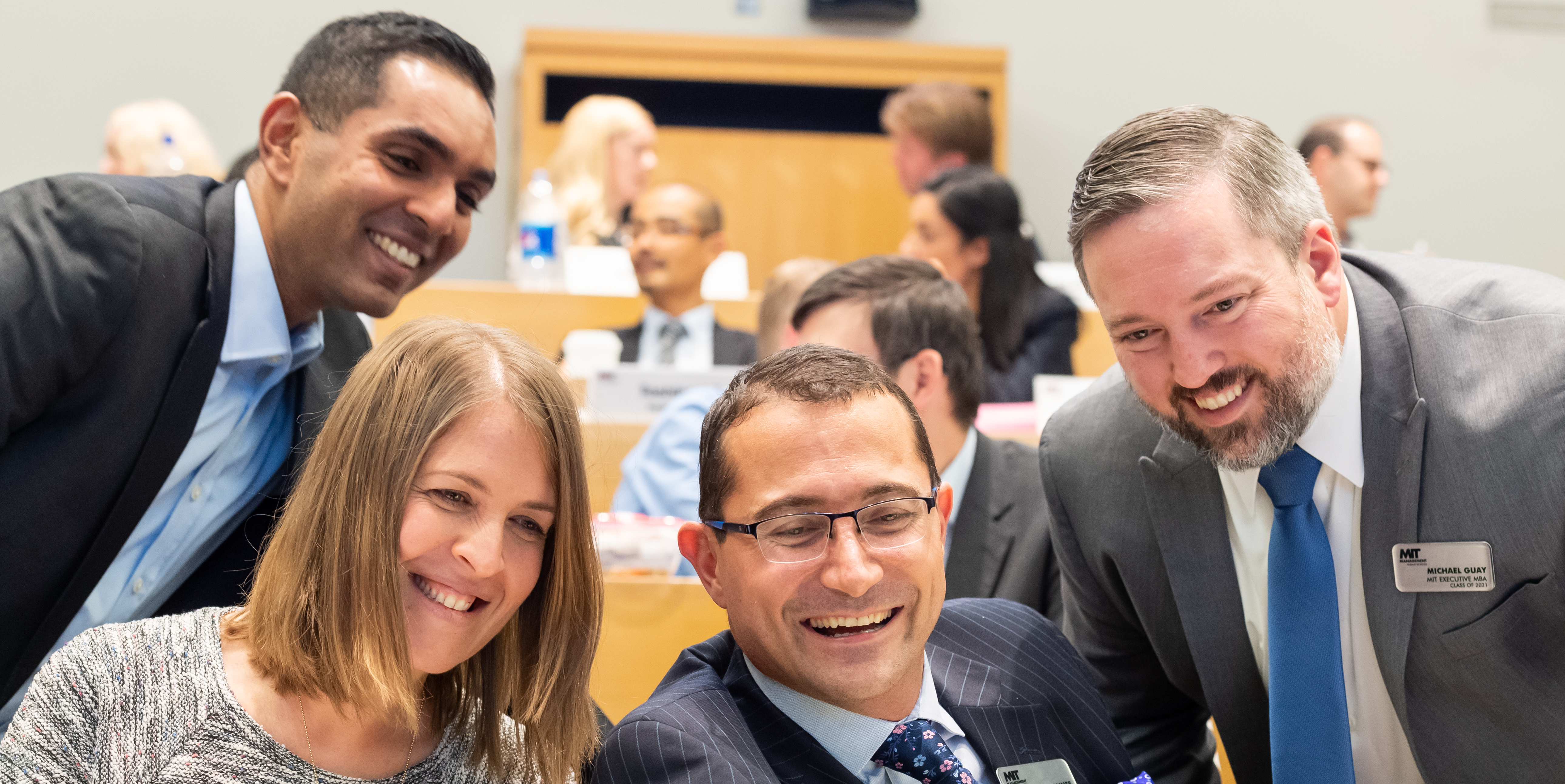 EMBA Students working together