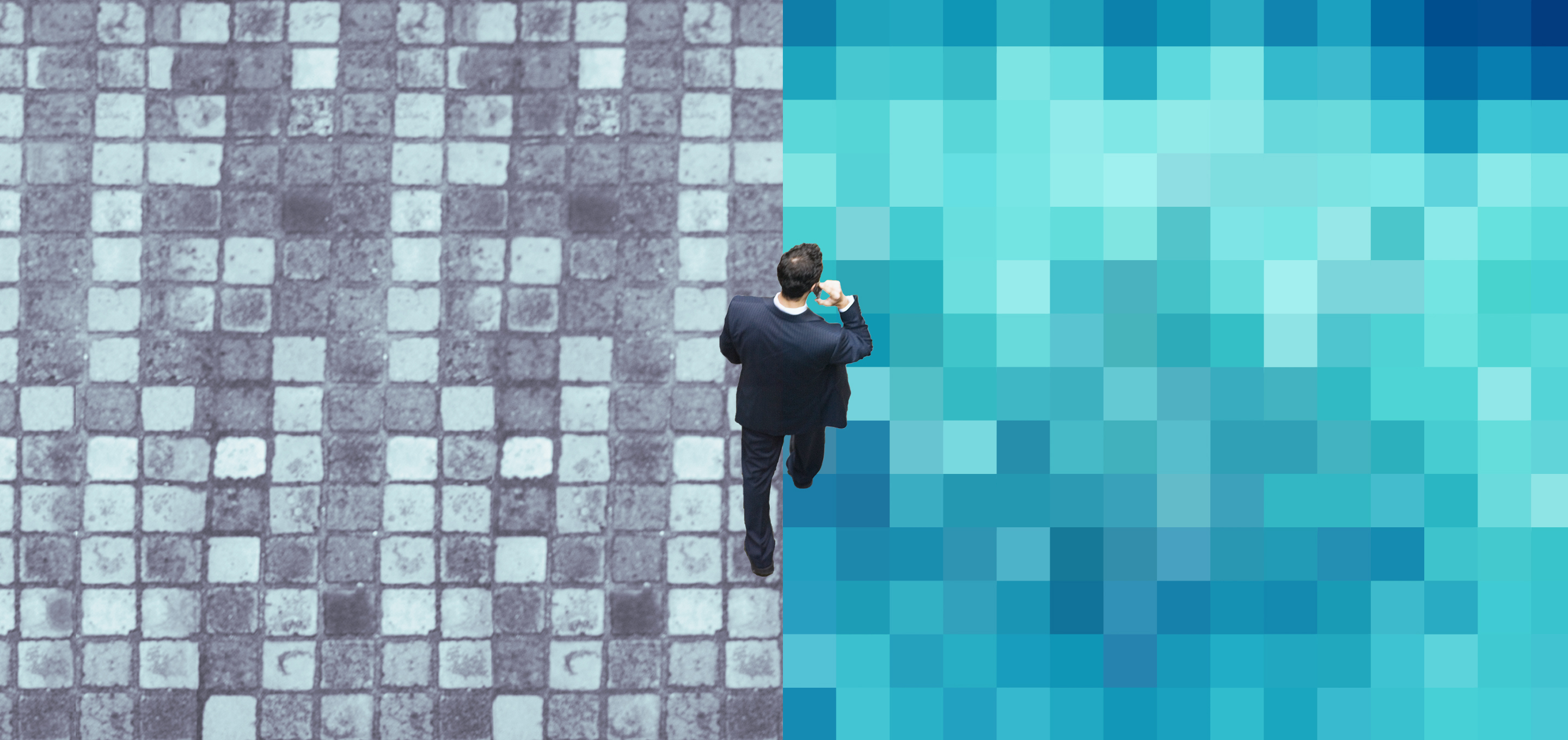 A business person walks across a canvas that is half made of old stone flooring and half made of digital pixels