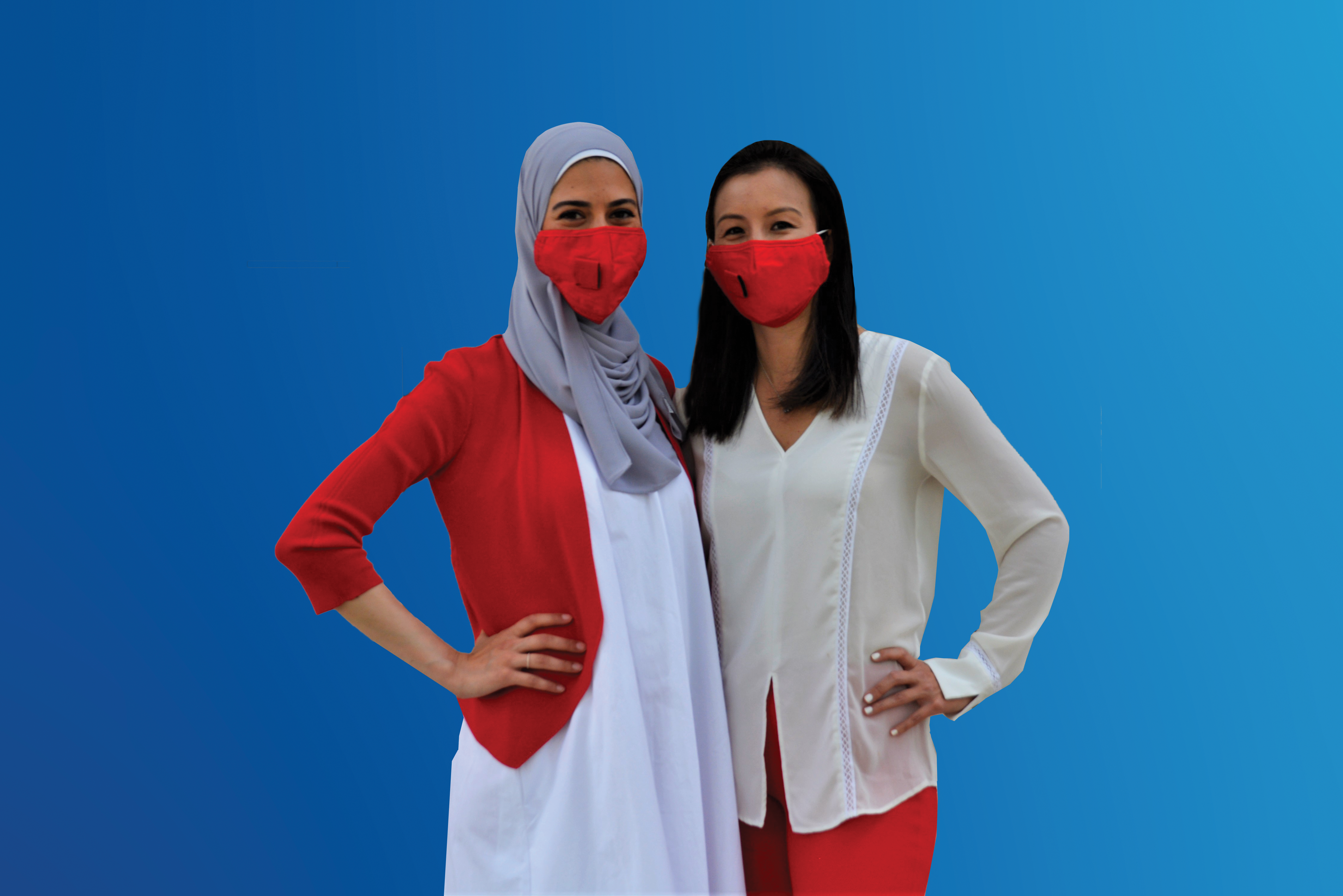 Aceil Halaby and Alicia Chong Rodriguez standing with masks