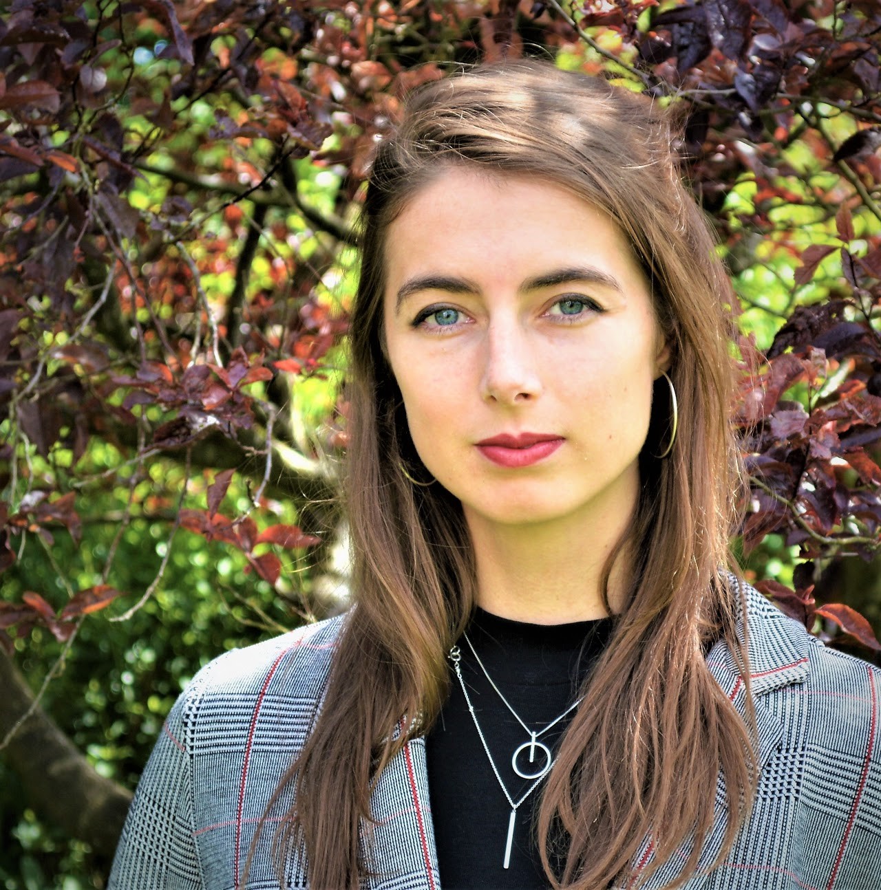 Headshot of MIT Sloan Assistant Professor Anna Stansbury