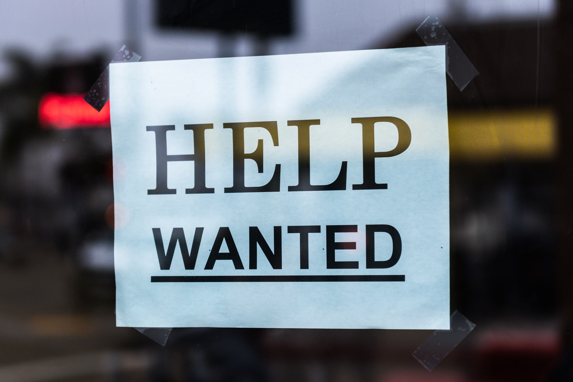 Decorative image of a sign saying "Help Wanted"