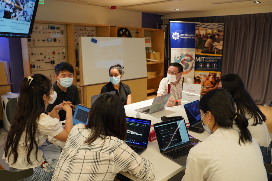 Caption:Students work in teams to tackle fintech challenges proposed by industry partners