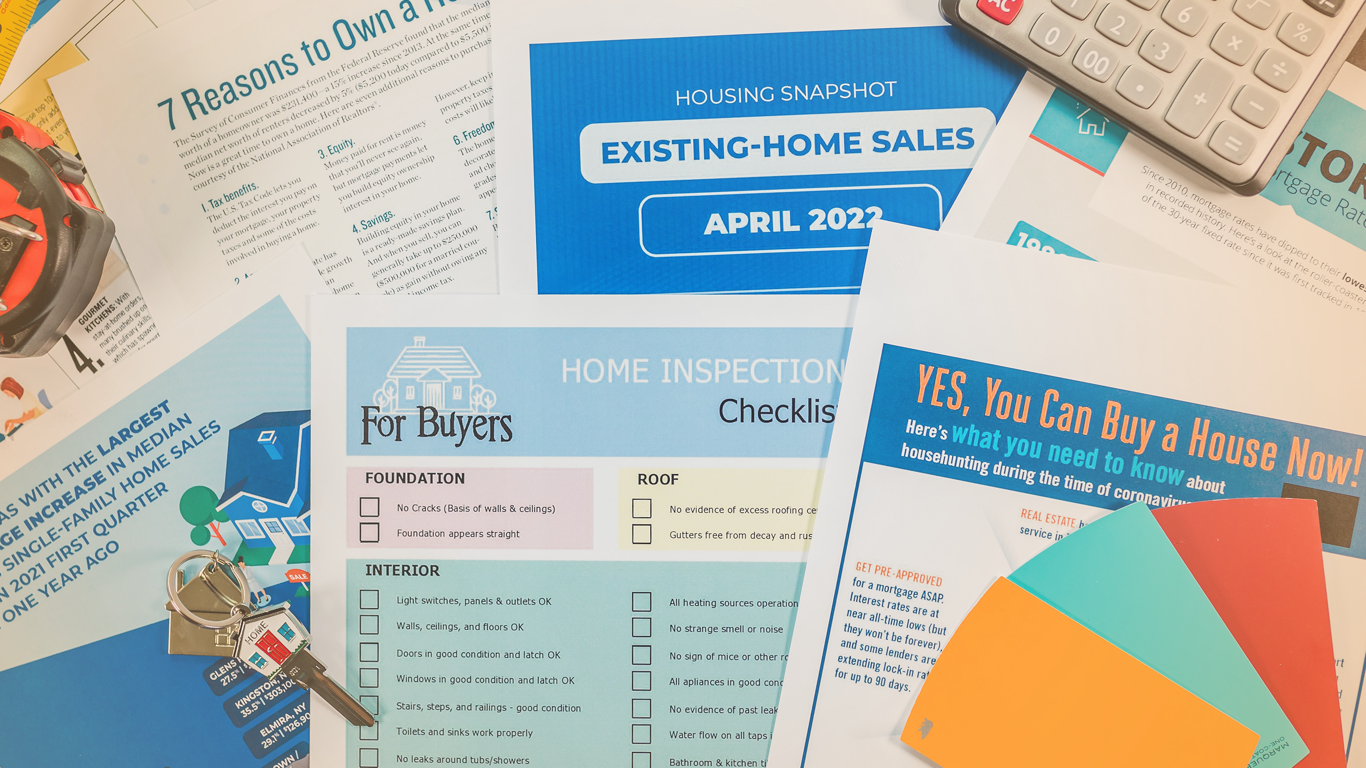Array of mortgage and real estate documents for prospective home buyers