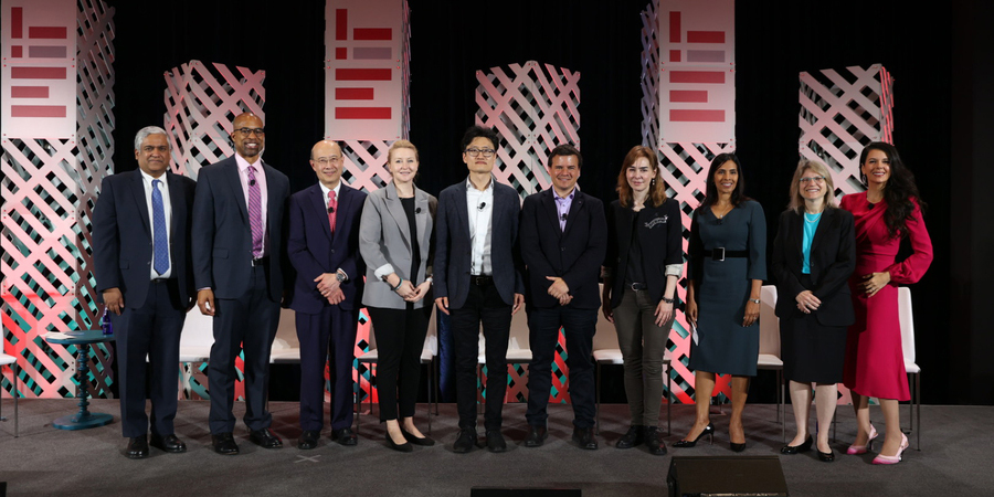 Professor Andrew Lo and other MIT faculty after their symposium