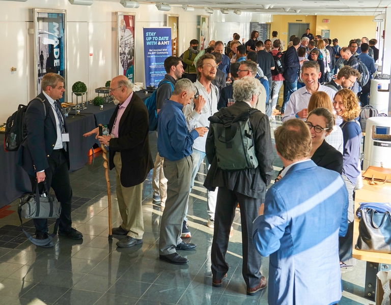 Symposium attendees gather in lobby