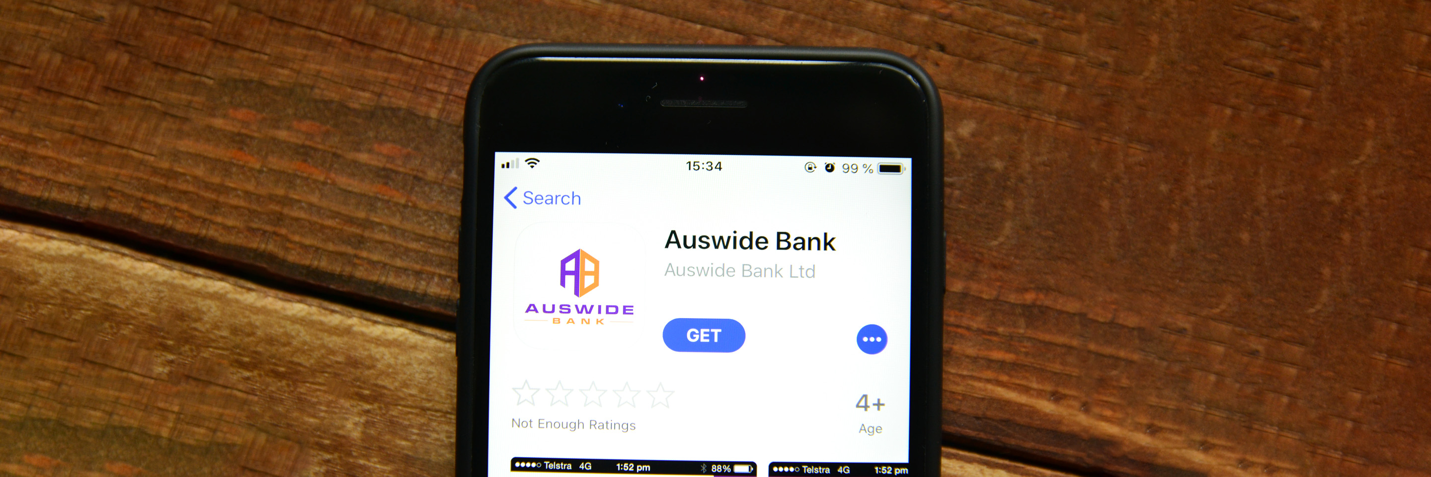 Auswide Bank iPhone app open on table