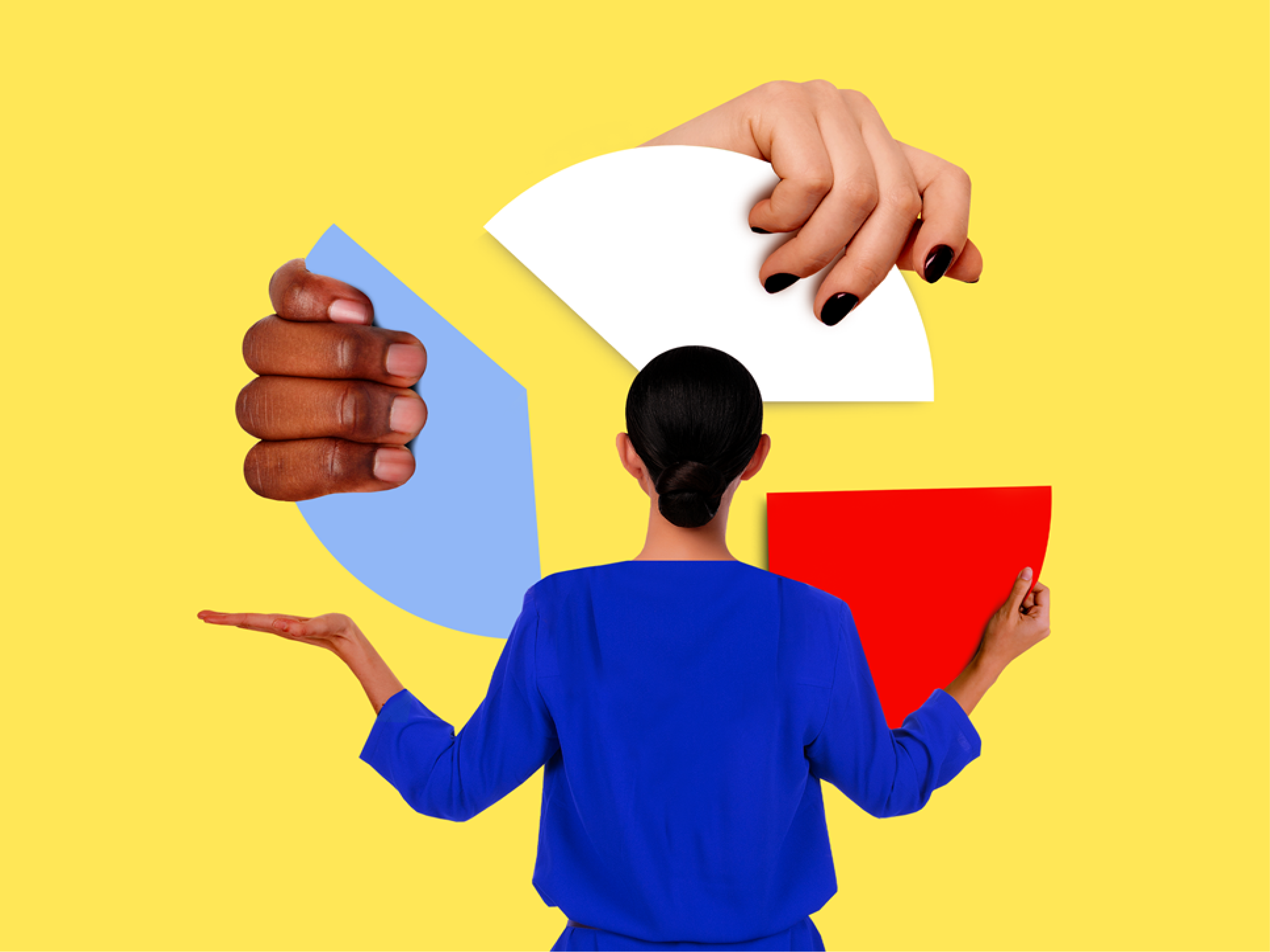 A woman holds up pieces of a pie chart
