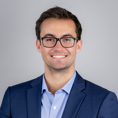 headshot of current PhD student, Chuck Downing