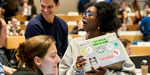 Students participate in group discussion during class