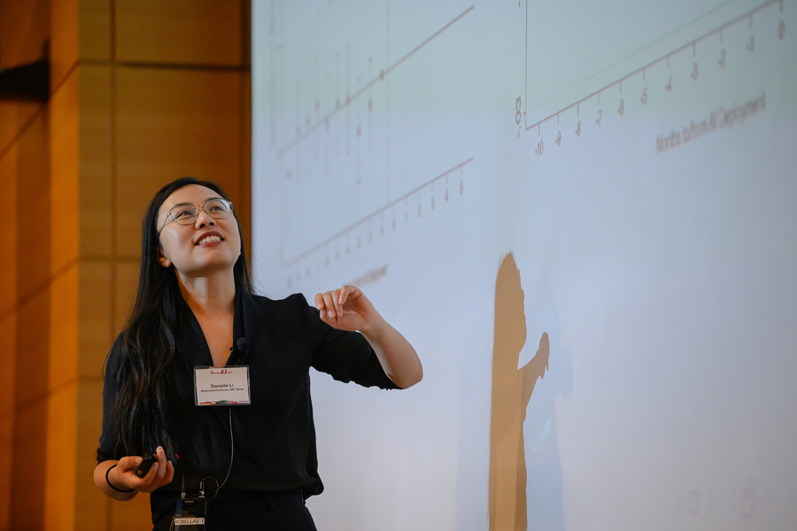 Associate Professor Danielle Li presents her talk at the conference