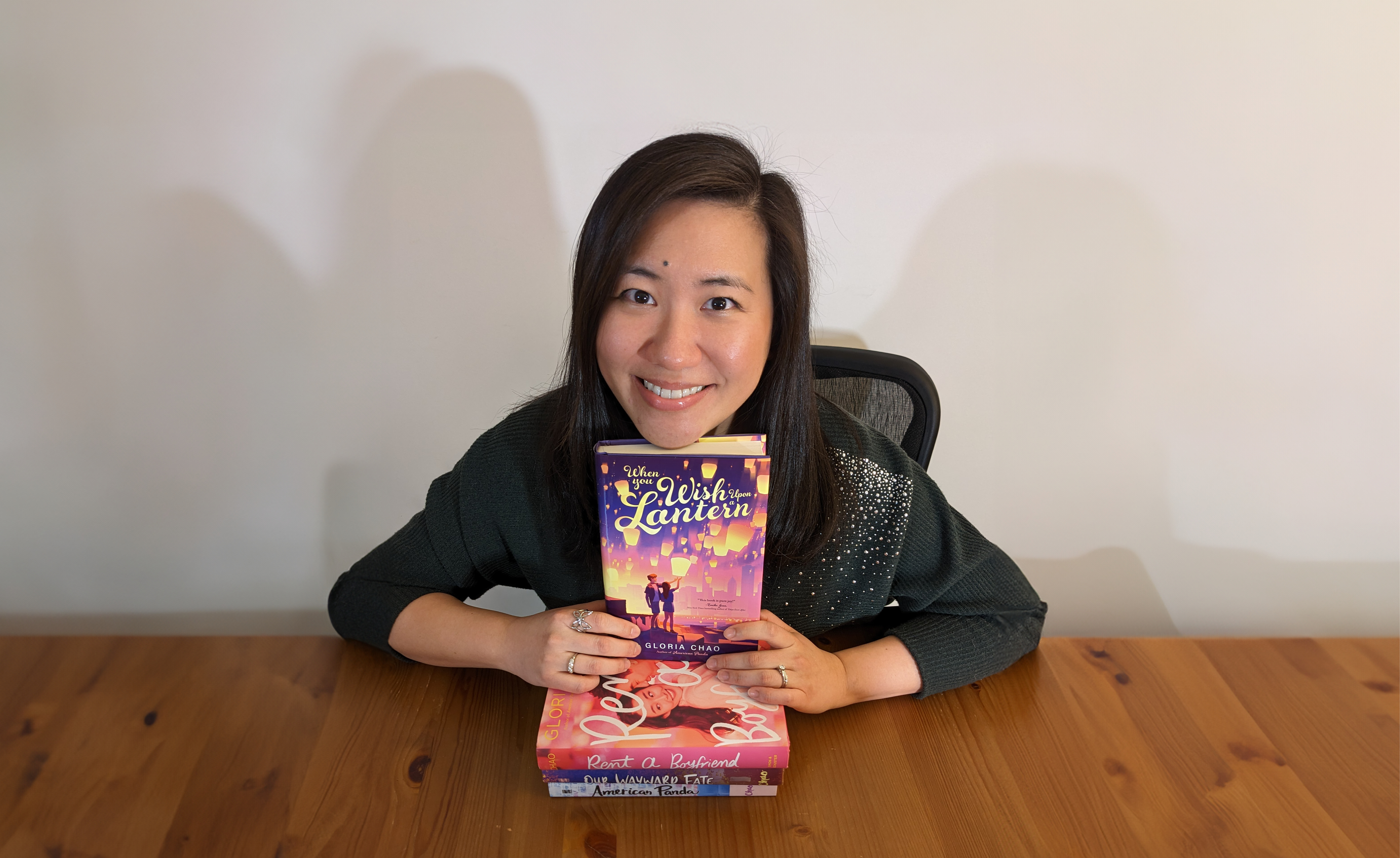 Author holds books she has written