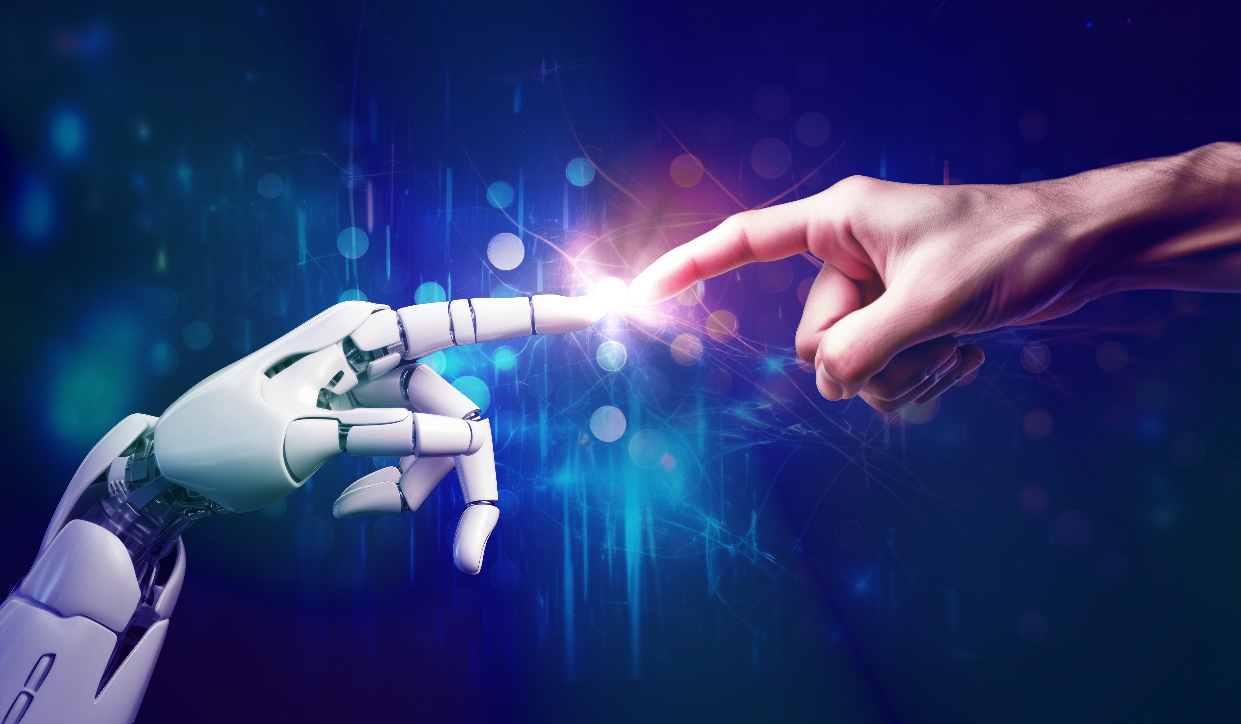 Robot hand touching human hand.