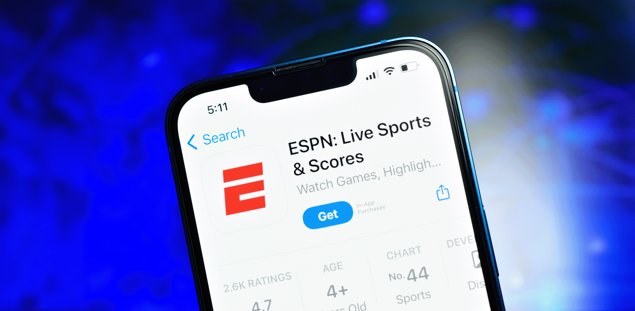Image of ESPN logo with its site open on a cell phone