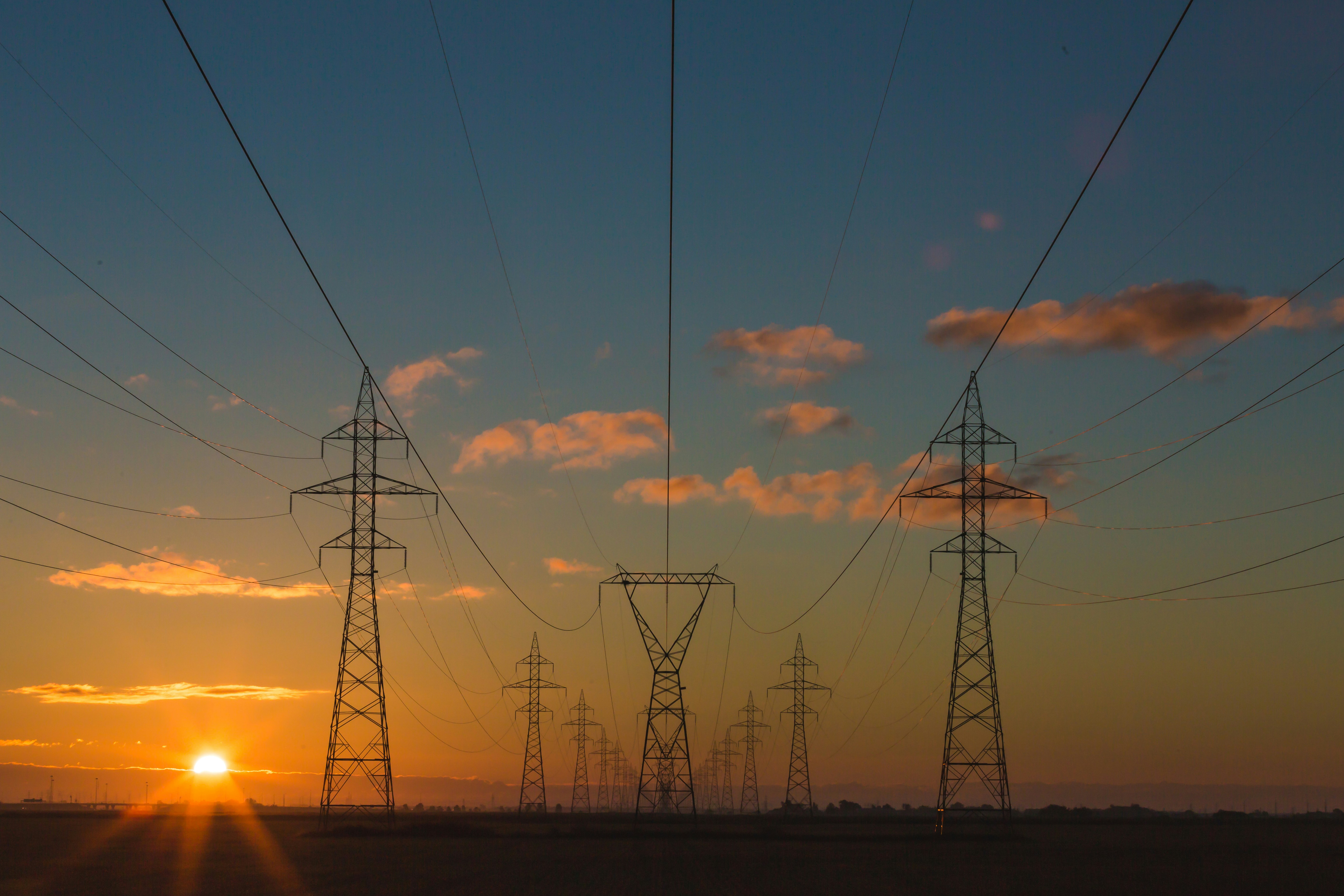 Power lines as the sun is getting ready to set
