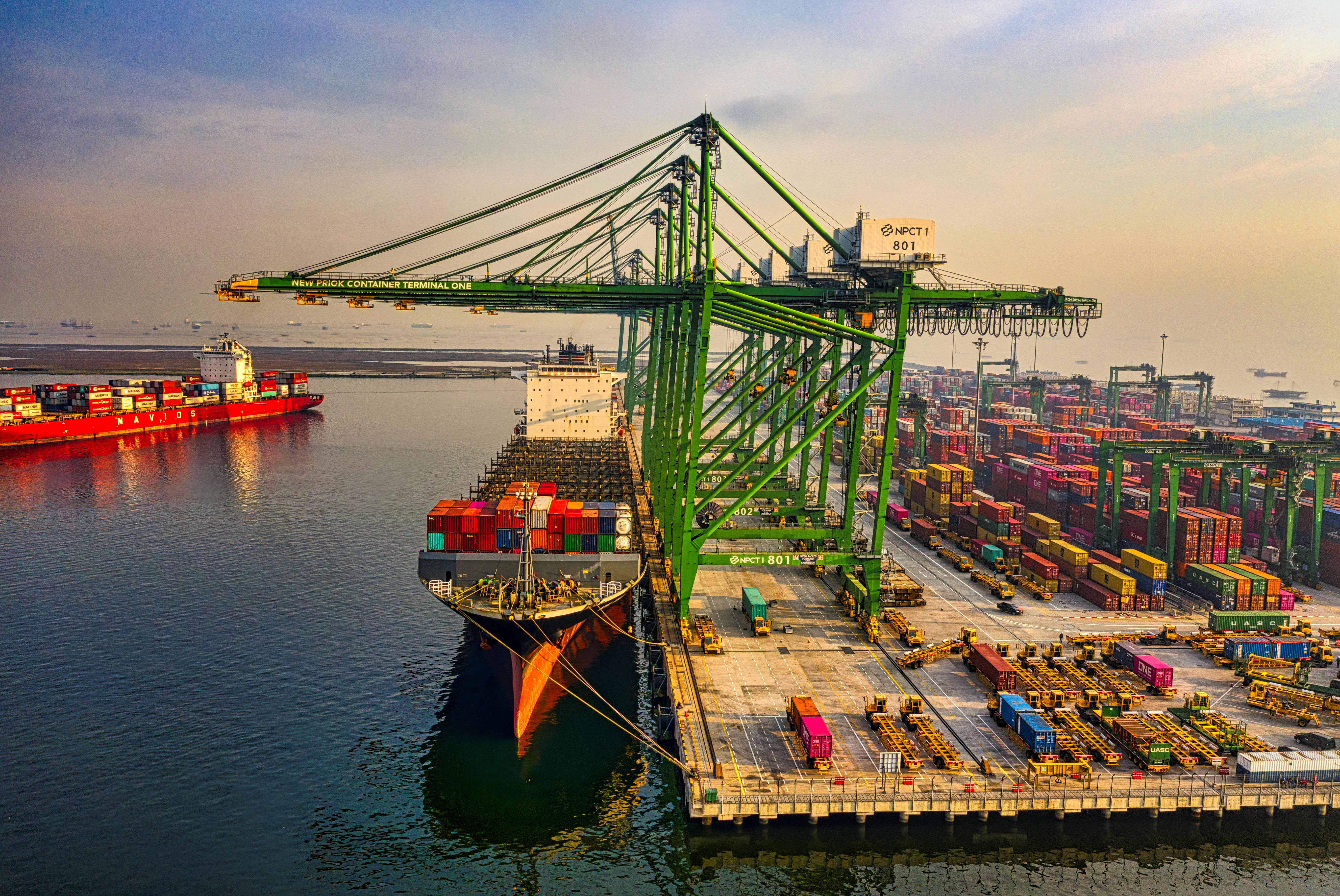 Image of a cargo ship and containers at a port