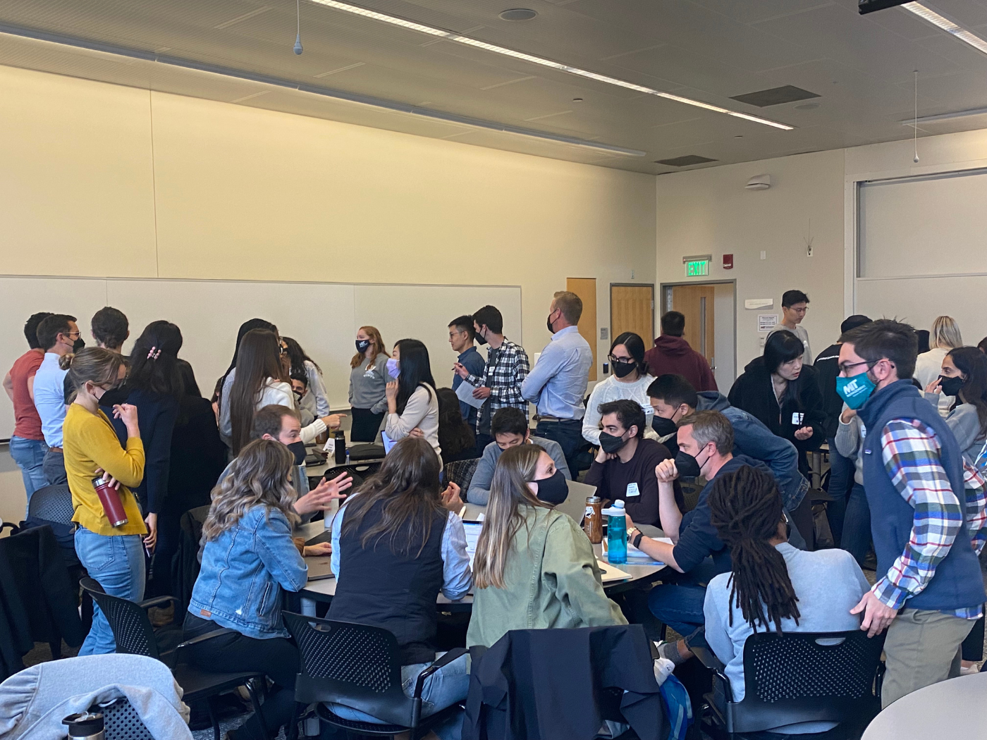 students around a table running the climate action simulation