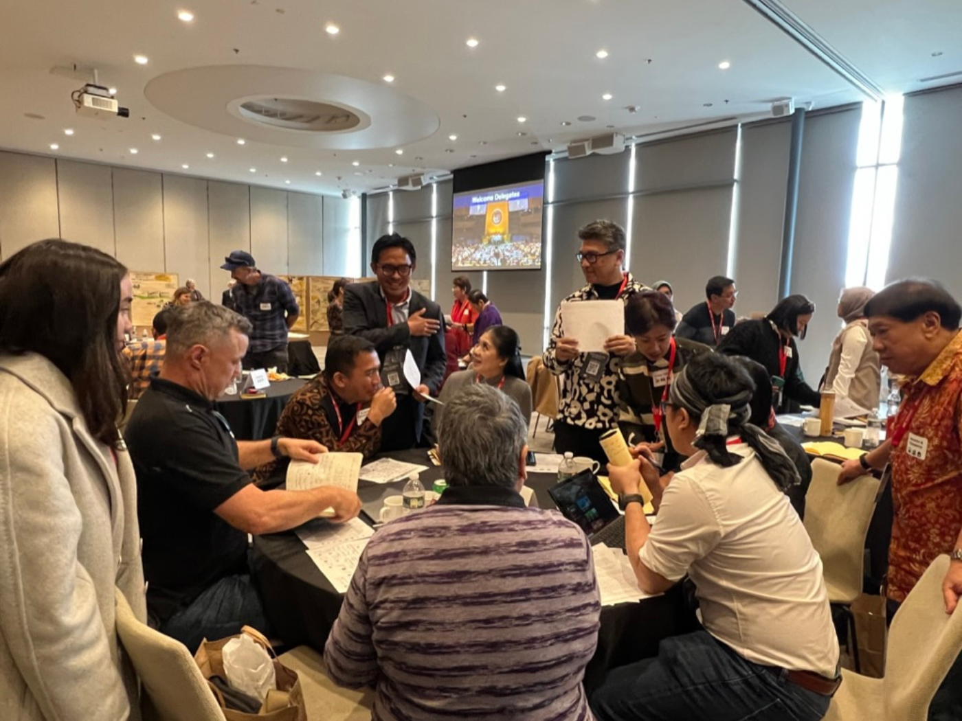 people around a table doing the climate simulation