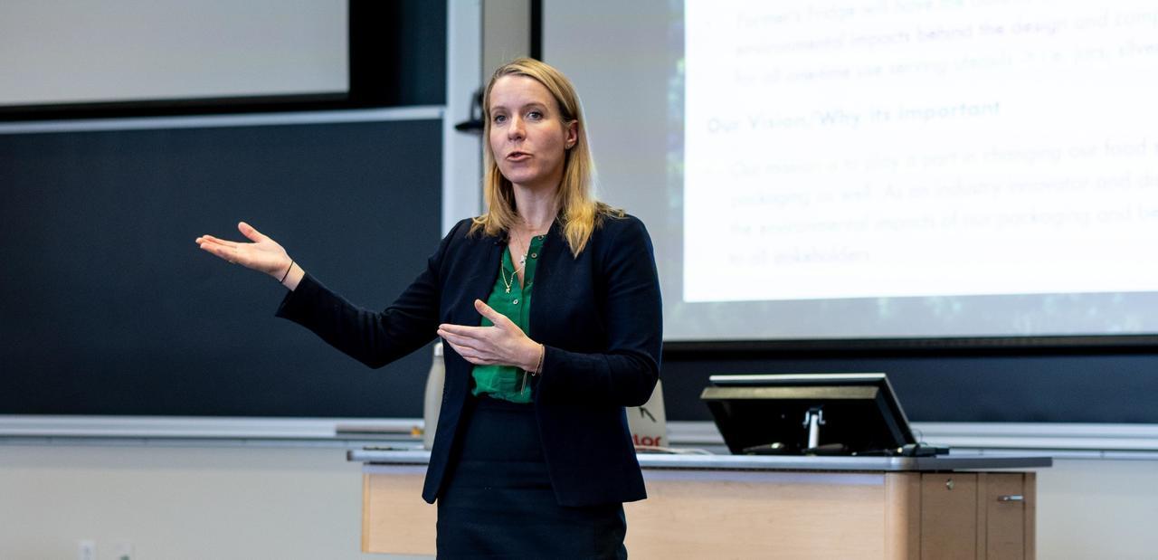 Bethany Patten speaking in a classroom.