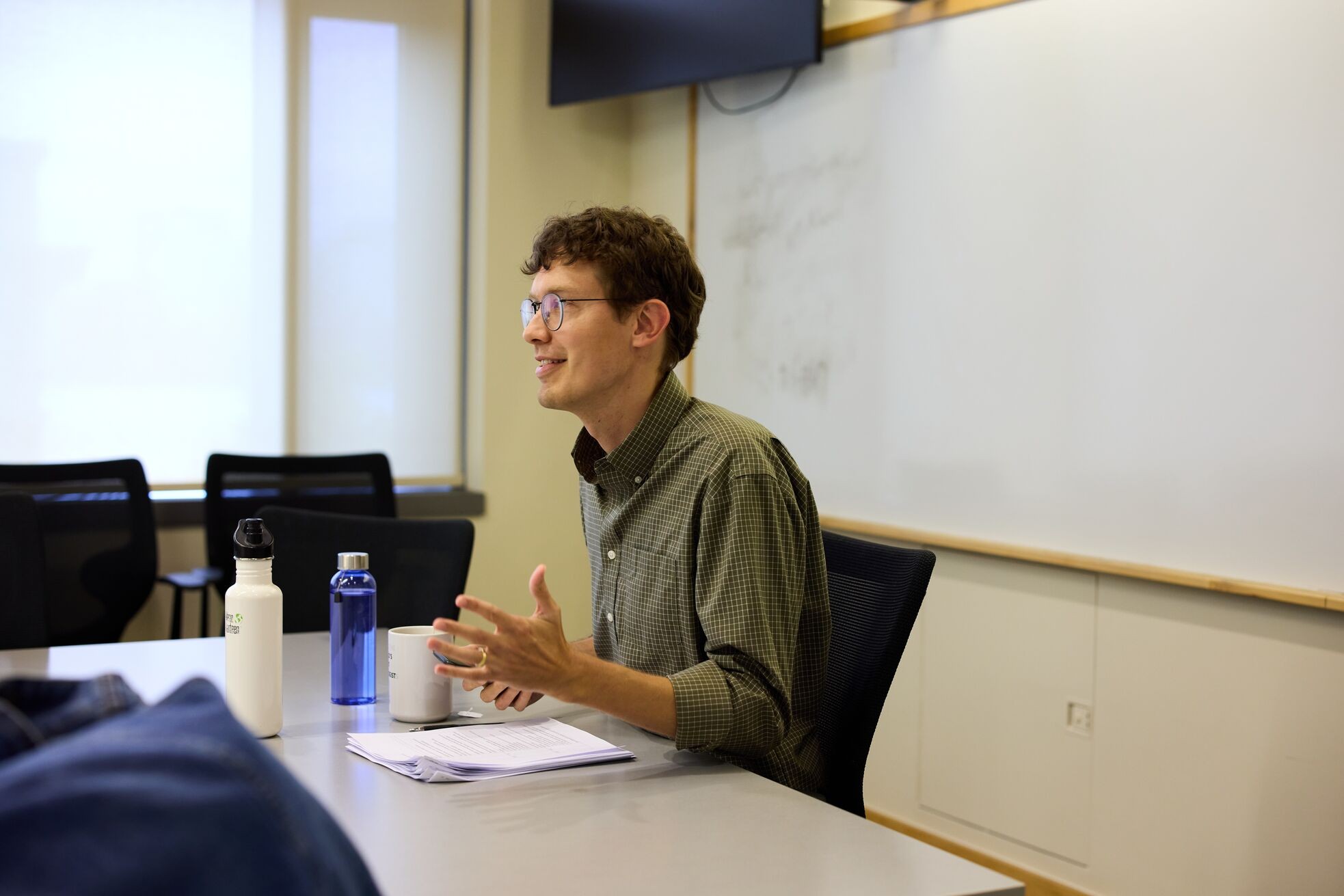 MIT Sloan Associate Professor Nathan Wilmers leading a seminar