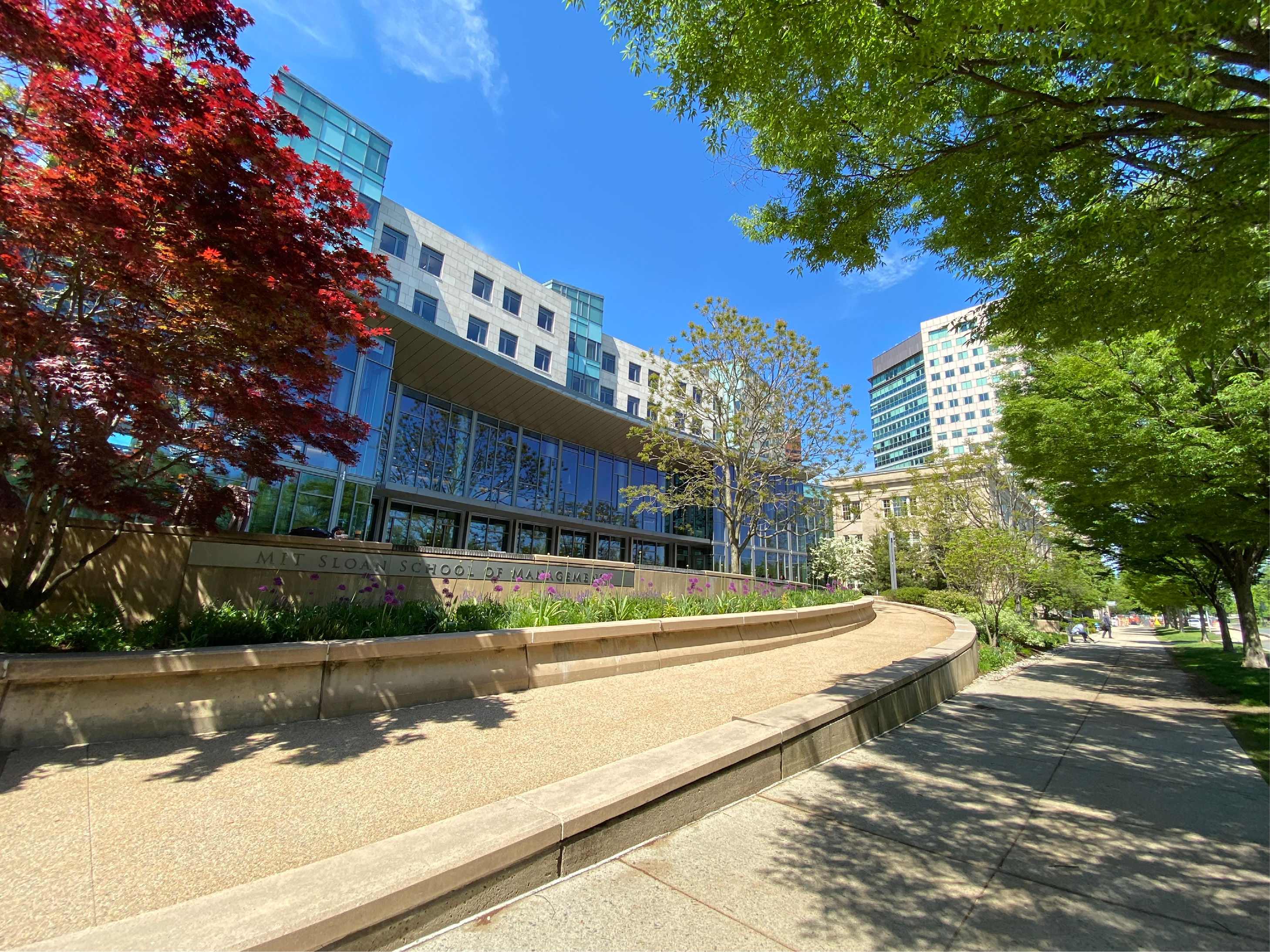 Daytime photo of the MIT Sloan School of Management building E62
