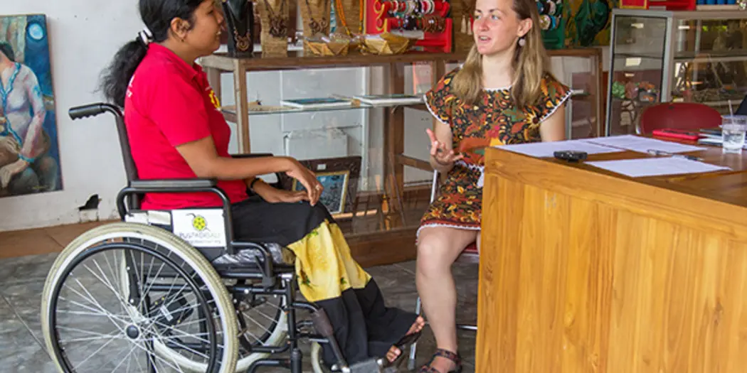 &nbsp;Sarah Tress, SB '19 (right), conducts market research about Loop's wheelchair cushion in Bali.