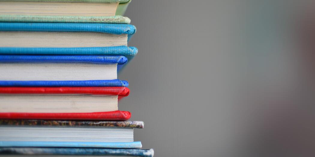 Close up photo of a stack of books