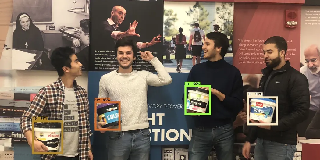 A-Lab Qroma team with their paint can images. 