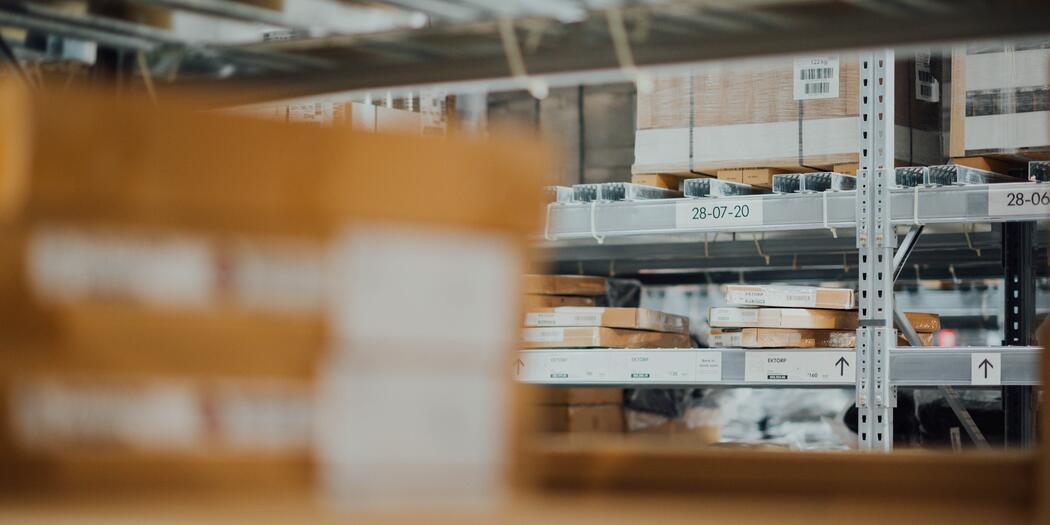 Boxes on shelves in warehouse