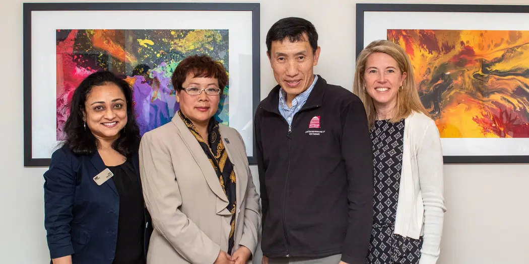 From left to right: Urmi Samadar, Xuemei Fei, Yasheng Huang, and Tara Walor