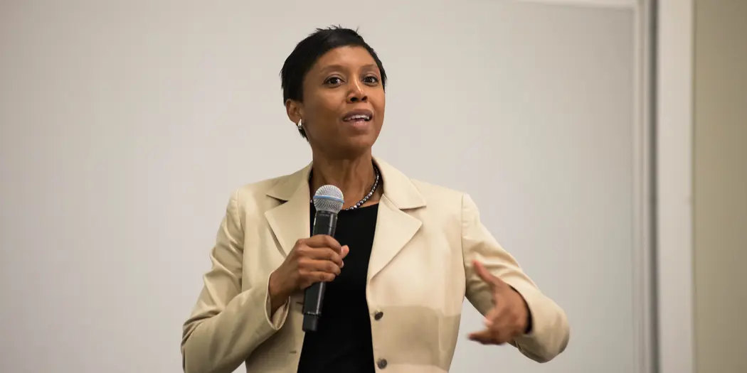 Michellana Jester, G-Lab faculty member, speaking with microphone