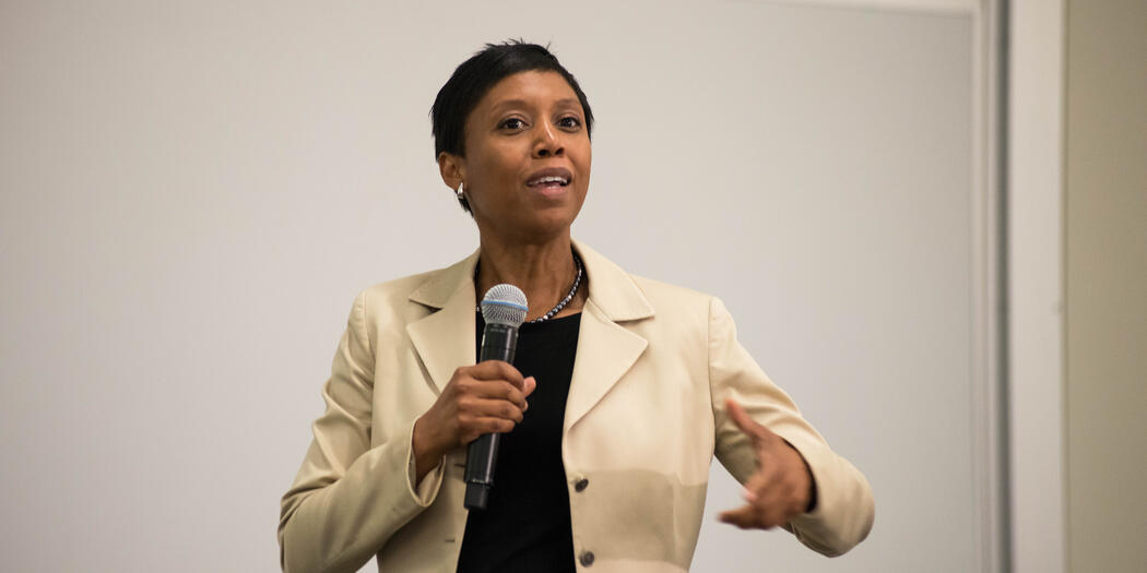 Michellana Jester, G-Lab faculty member, speaking with microphone