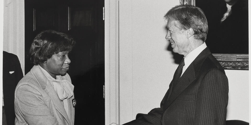 Phyllis Wallace shaking hans with President Jimmy Carter in 1979