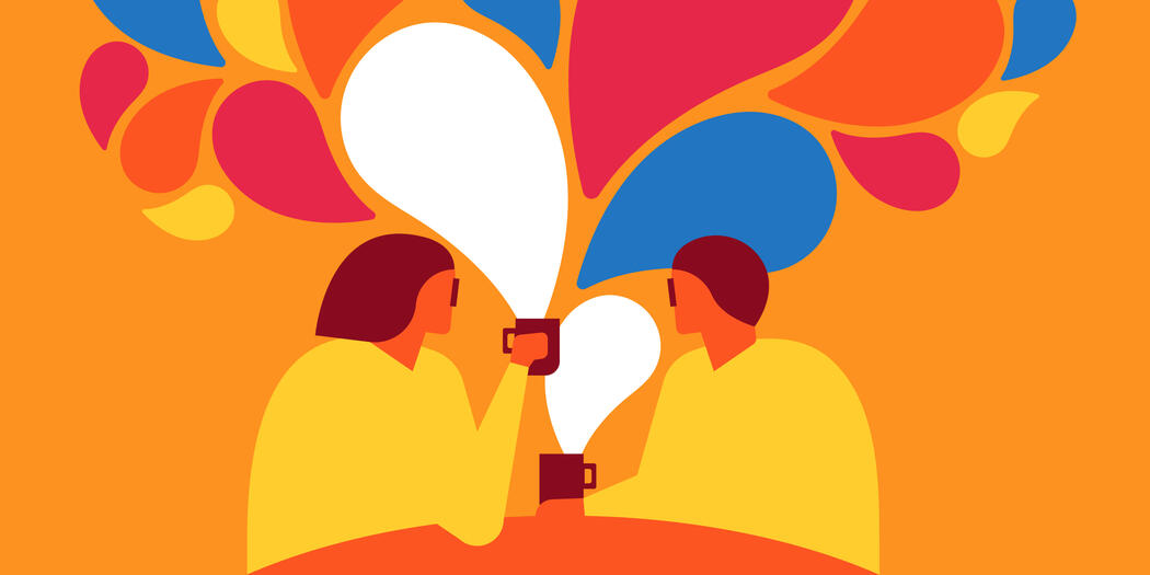 Two people having a conversation over coffee with ideas blooming